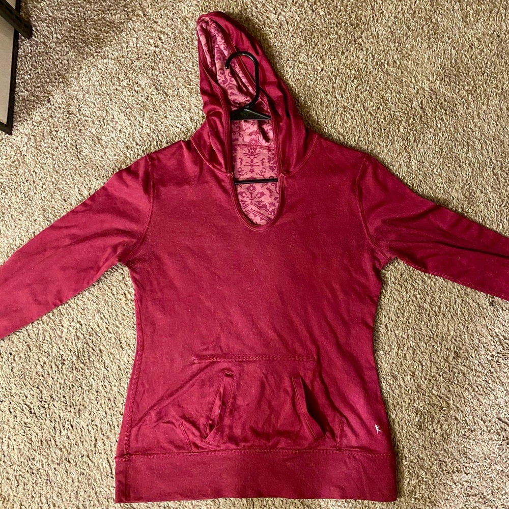 This is a reversible woman’s hoodie.  It is Danskin NOW brand.Gently used